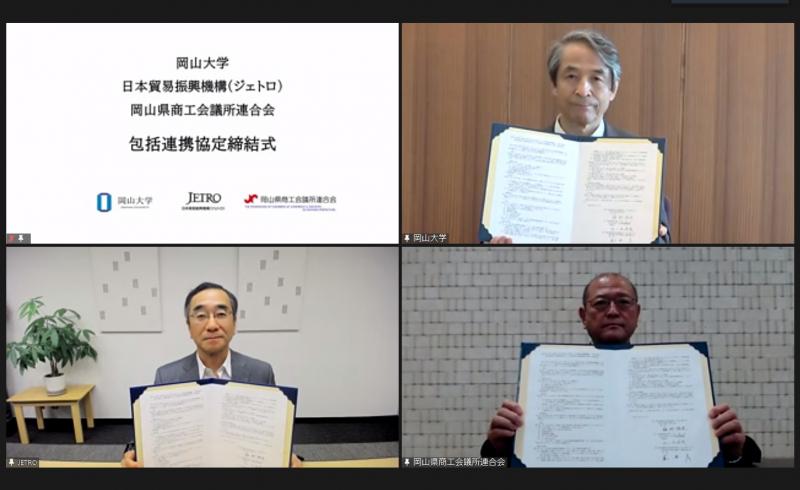 President Makino (top right) Chairman Sasaki (bottom left) and Chairman Matsuda presenting the signed agreement